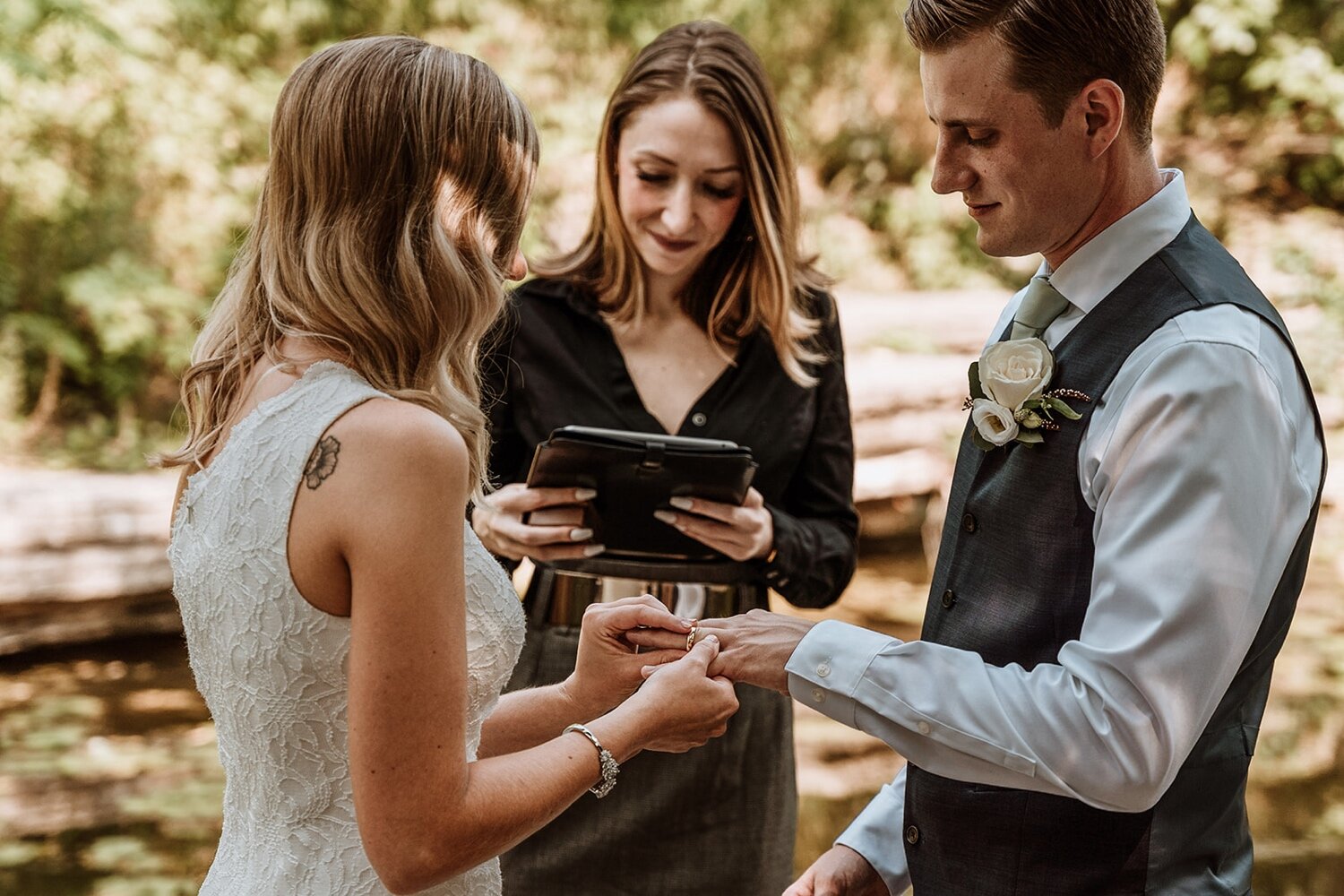 Bride puts ring on groom at intimate Chicago elopement