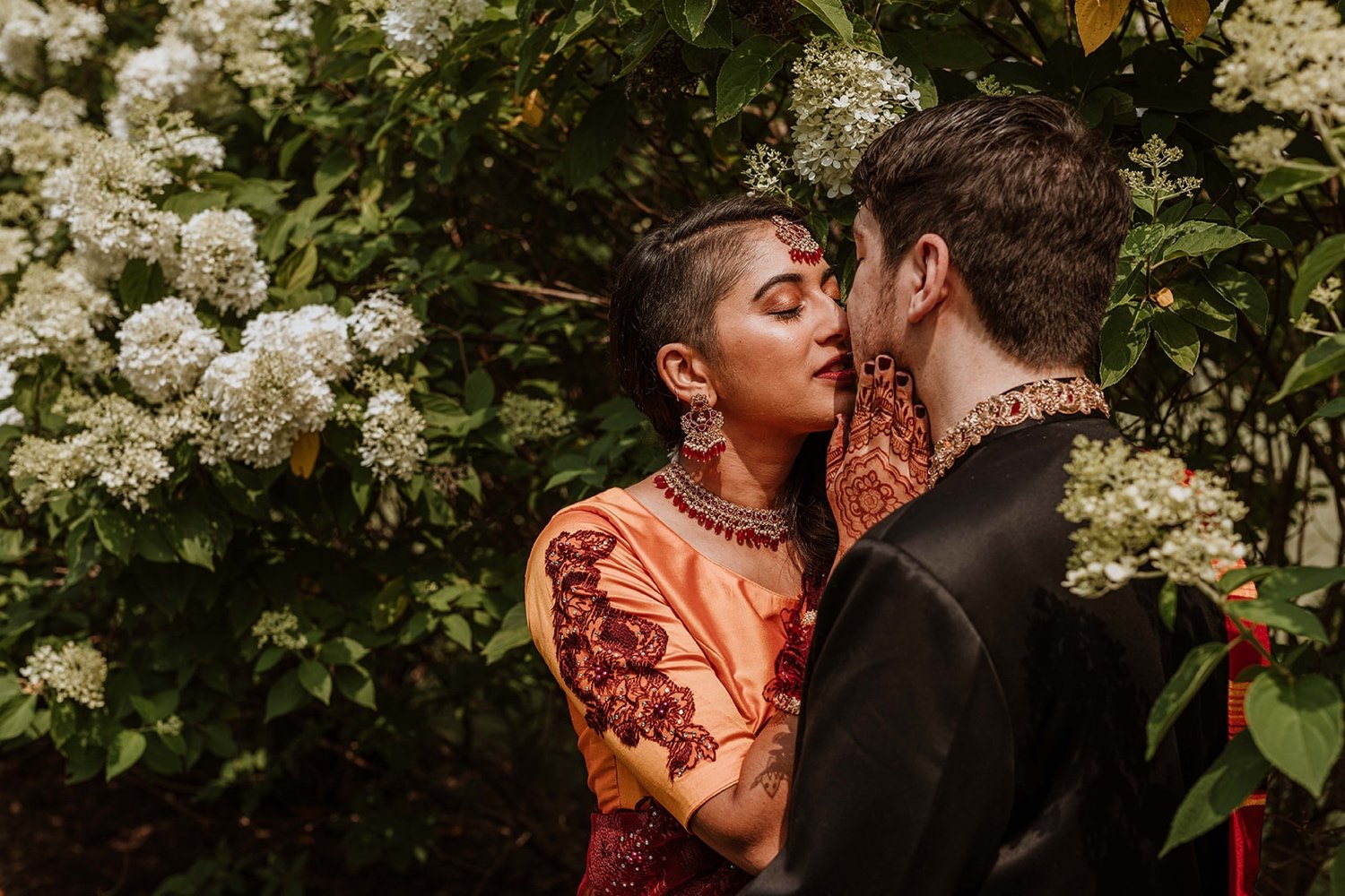 Bride and groom taking a moment together before their ceremony