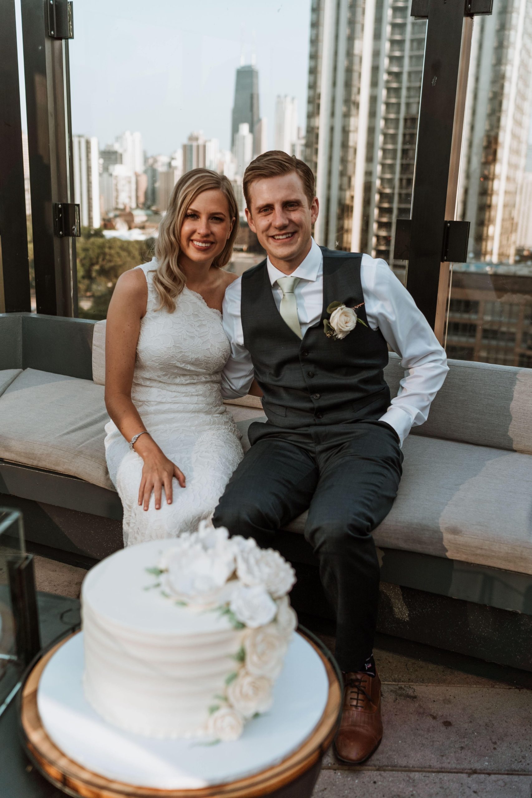 Bride and groom on their wedding day on the top of J Parker Restaurant