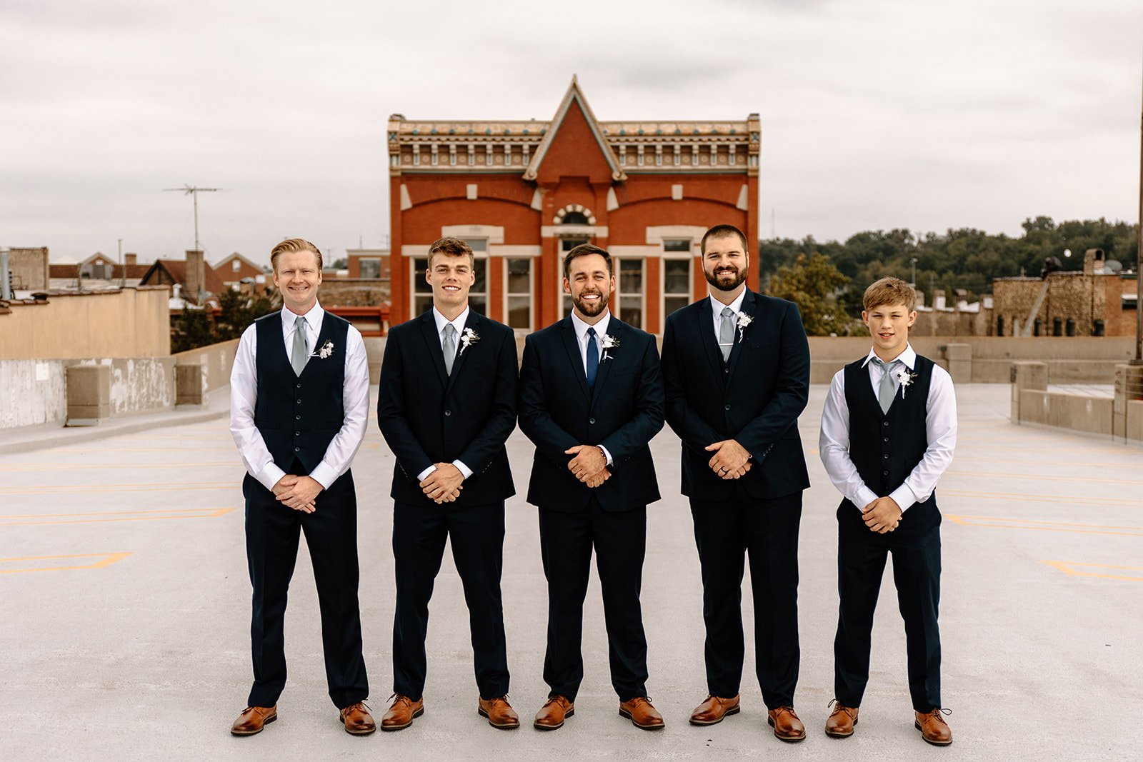 Groomsmen taking photos in Elgin Illinois