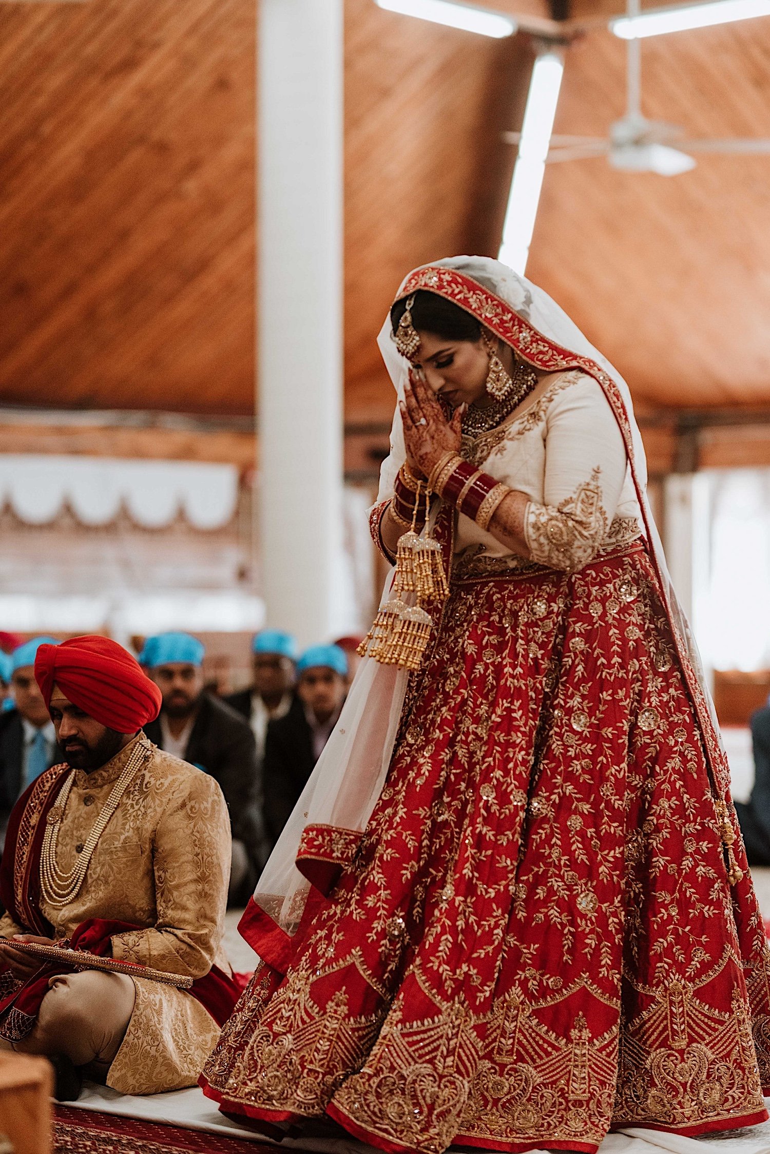 Bride and groom praying before Indian Wedding ceremony begins