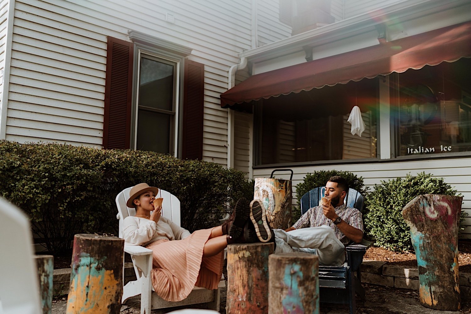 Couple sit and eat ice cream before surprise proposal