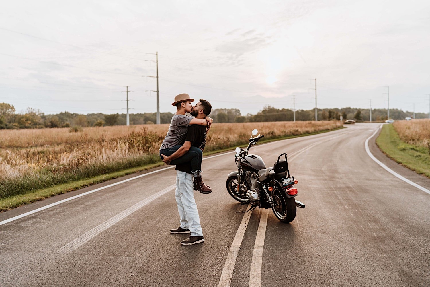 Couple kiss in middle of road before surprise proposal