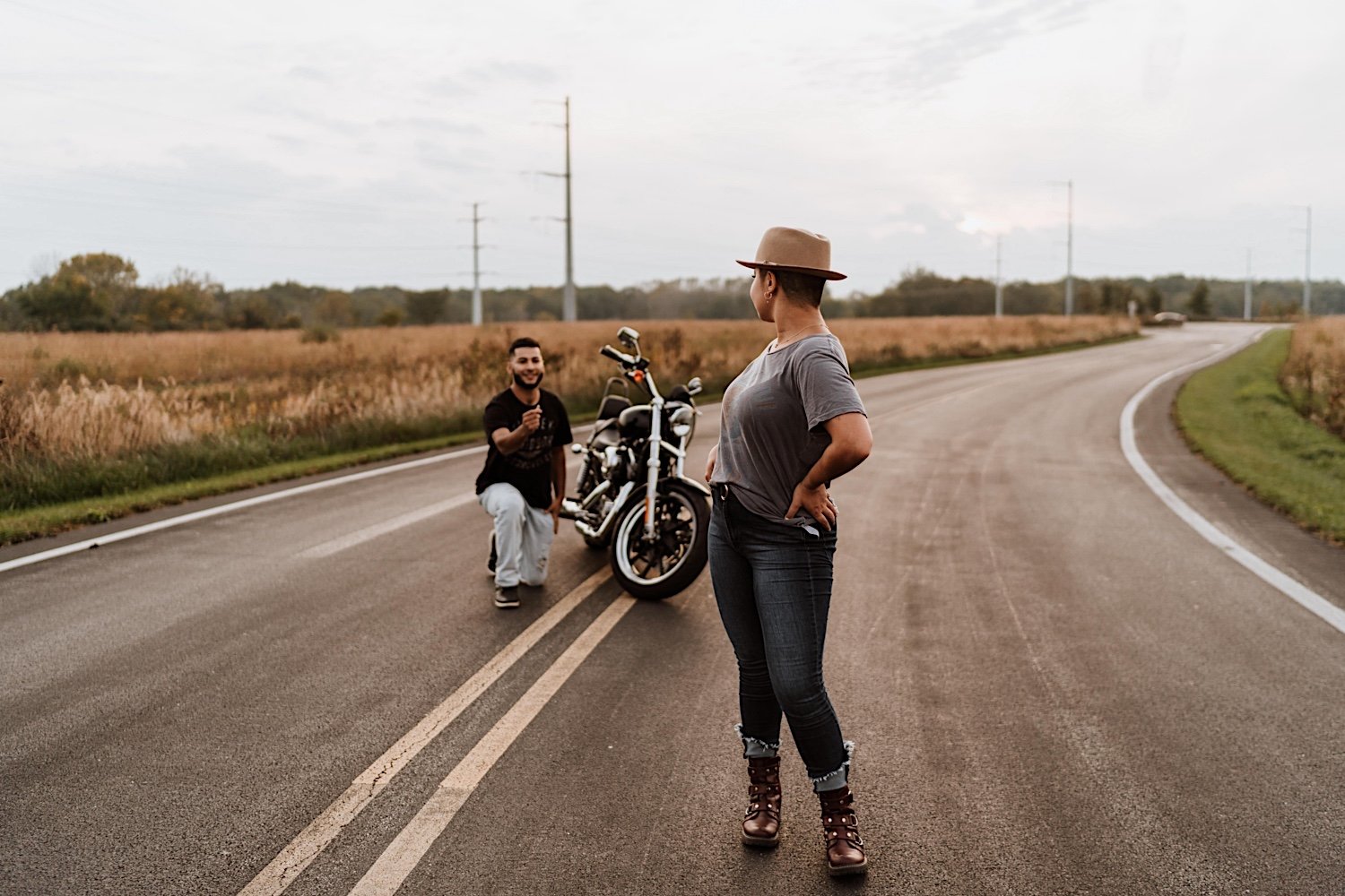 Girl turns to look at boyfriend during surprise proposal