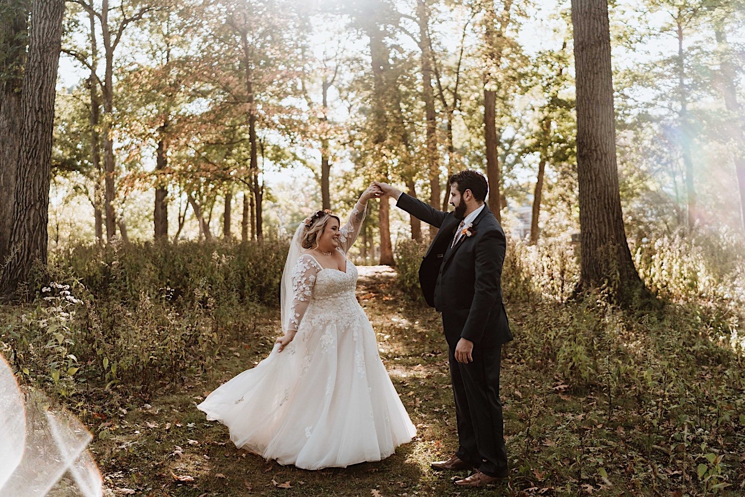 Bride and groom pose on Lake Ellyn Boathouse grounds before their wedding ceremony