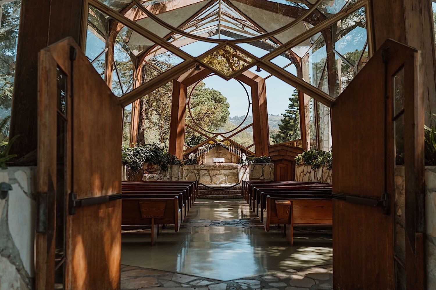 Wayfarers Chapel set up for a wedding ceremony on a summer day