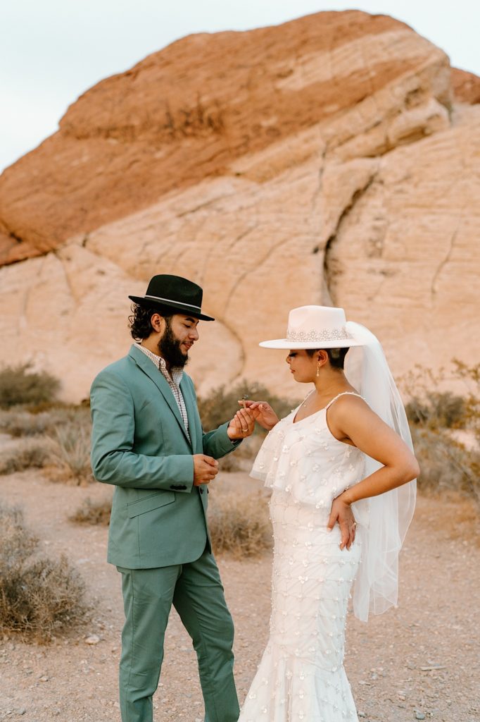 The bride and groom lighting a joint during their Las Vegas Elopement