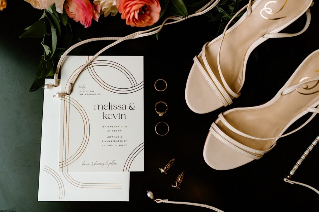 Wedding day details with cream, green and gold accents.