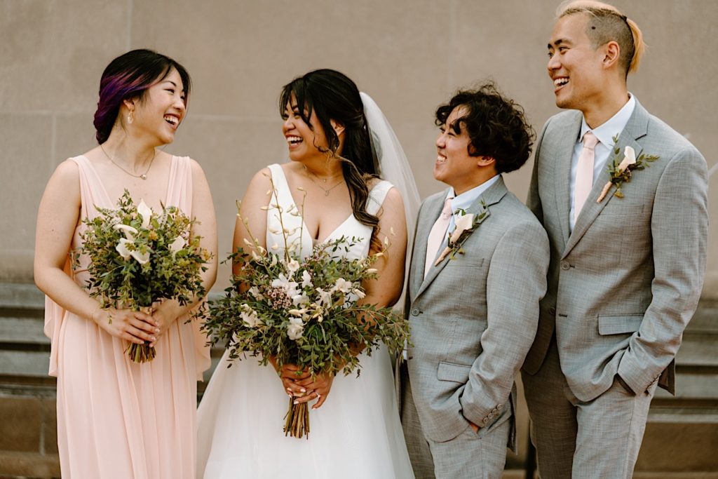 A bride stands with her bridal party prior to her wedding ceremony at Joliet Union Station.