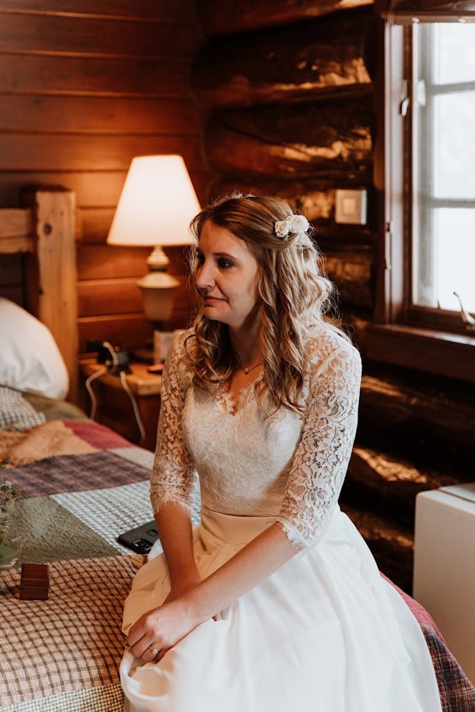 A bride sit reading letters to one another while reading letters from family and friends before they elope at Starved Rock National Park
