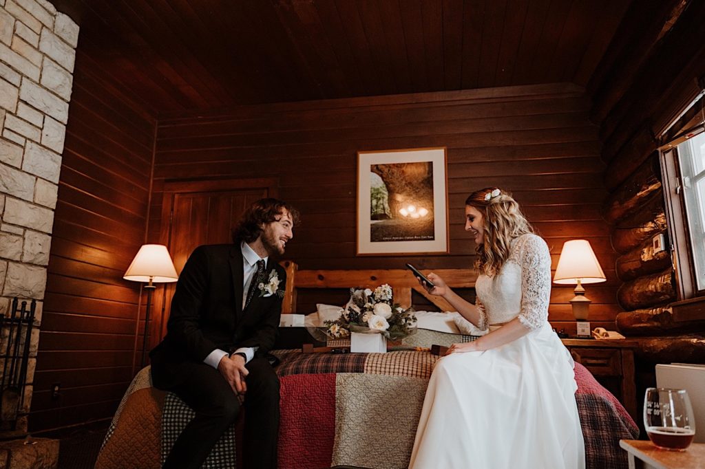 A bride and groom sit exchange vows with one another before they elope at Starved Rock National Park