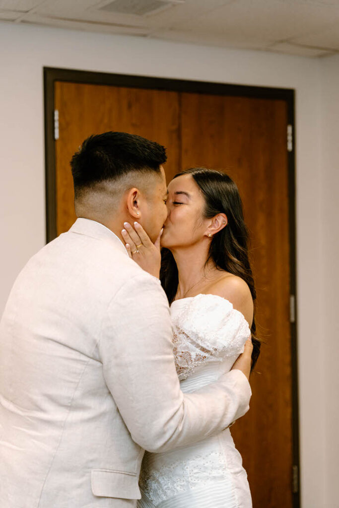 bride and groom's first kiss - chicago city hall elopement
