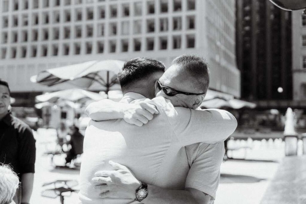 two men hugging