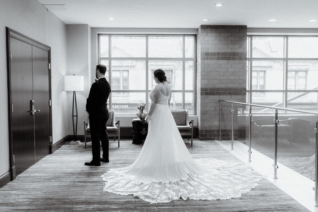 Bride and Groom first looks at their hotel next door by Osteria Via Stato