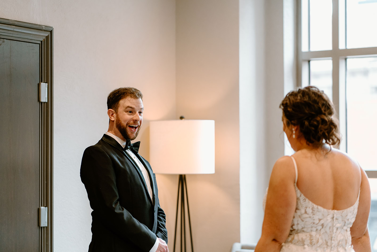 Bride and Groom first looks at their hotel next door by Osteria Via Stato