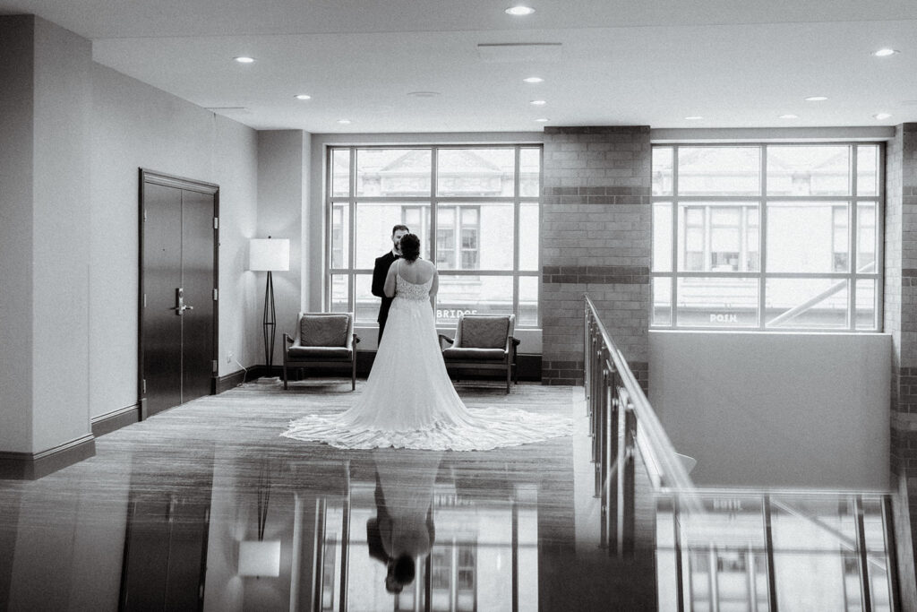 Bride and Groom first looks at their hotel next door by Osteria Via Stato